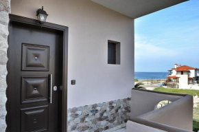 Отель Palm Tree Apartments  Полигирос